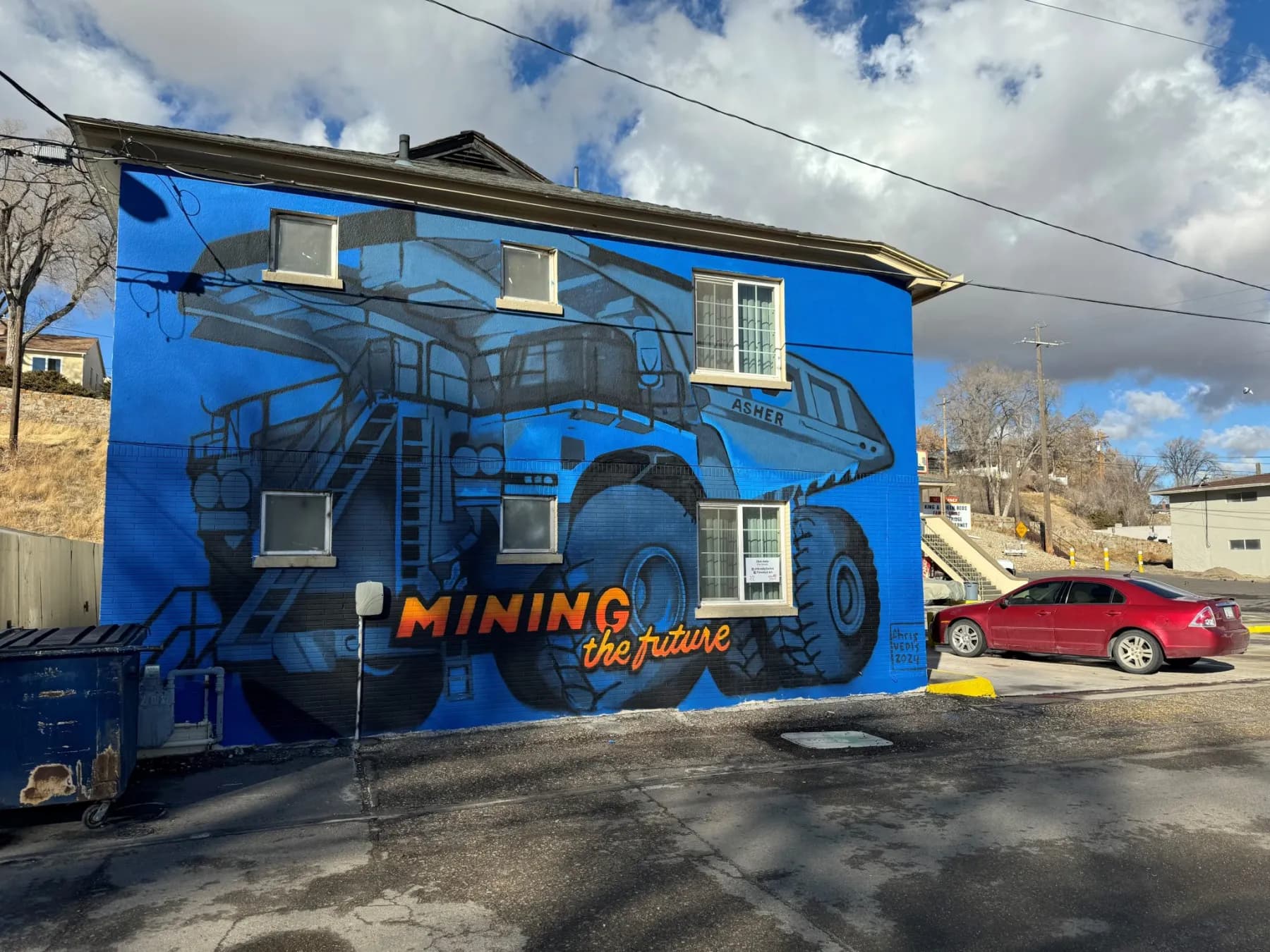 Local artists paint large mining-themed murals in Nevada's city of Elko