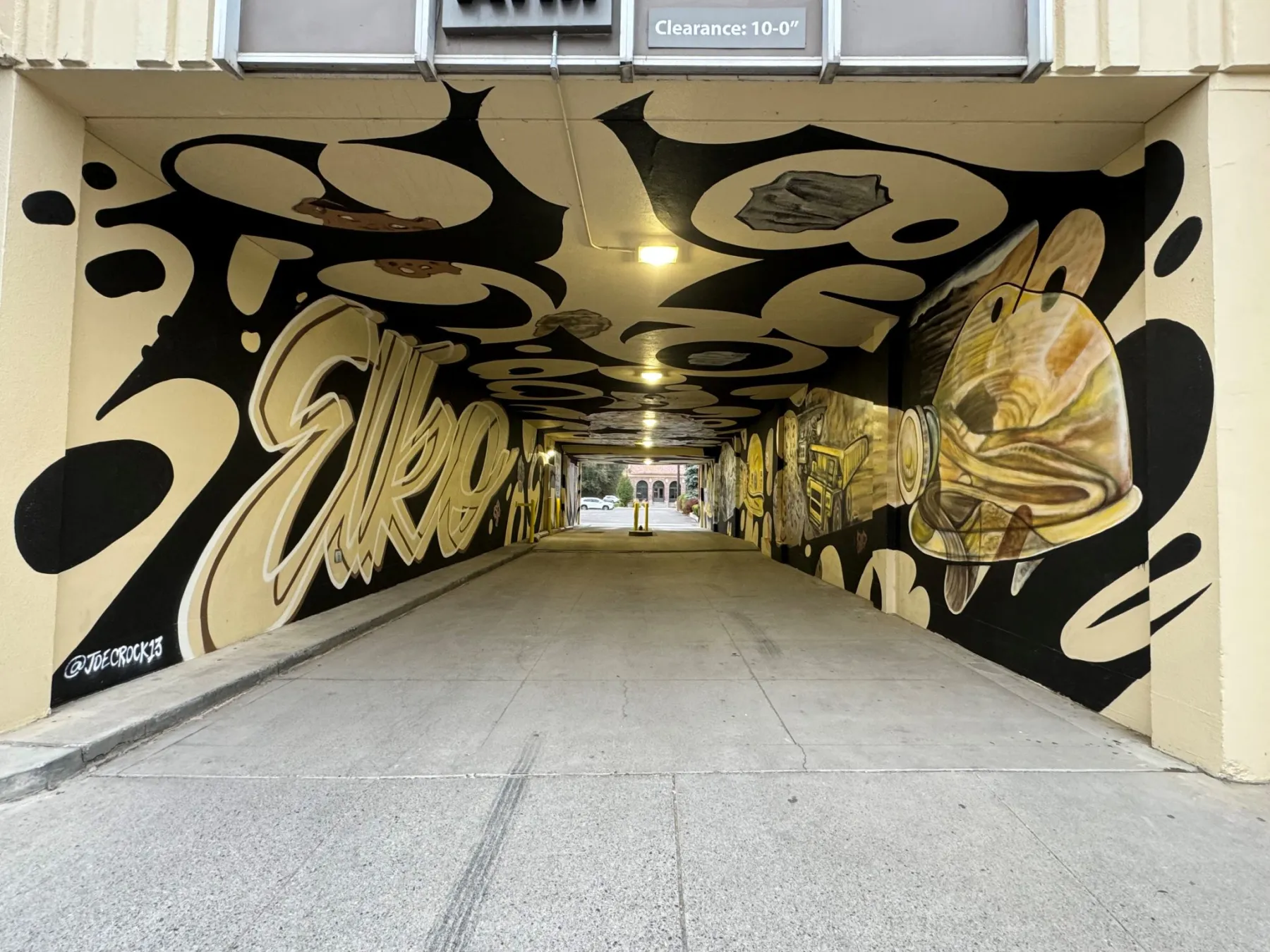 Local artists paint large mining-themed murals in Nevada's city of Elko