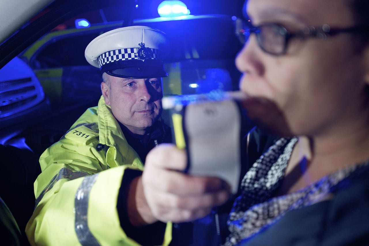Cannabix vies to be first to capitalize on difficult cannabis impairment market - police breathalyzing driver by roadside