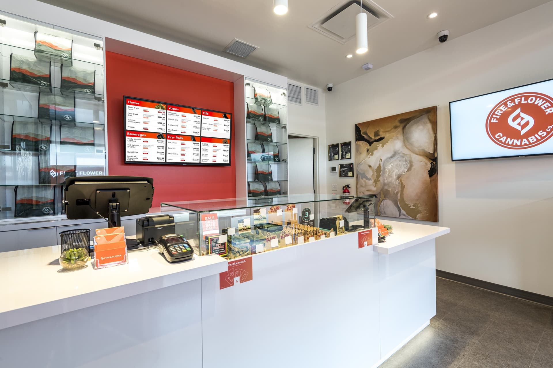 Inside Fire & Flower store showing counter and product selection