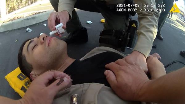 Fentanyl video by US cops shows officer receiving narcan after investigating a white substance