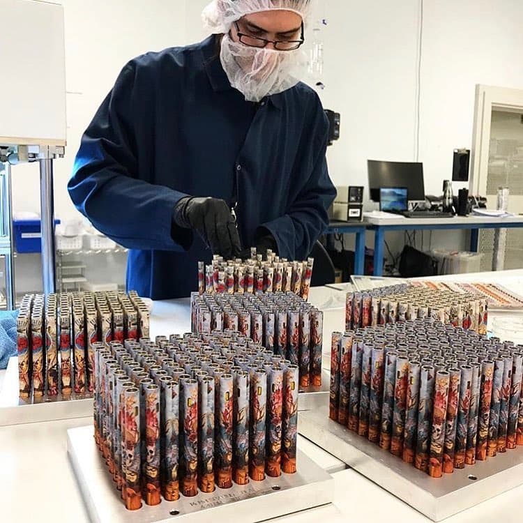 Greentank Technologies employee organizing vape packs