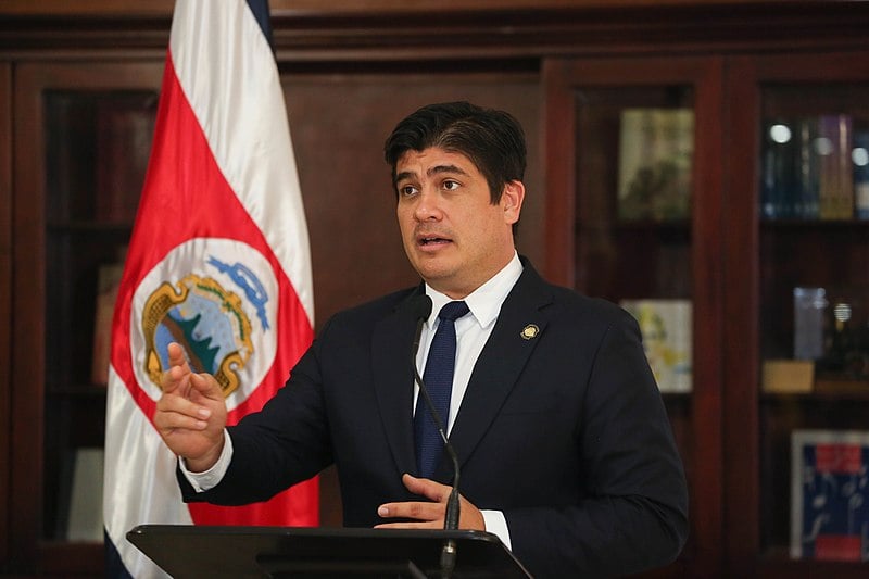 Costa Rica's President Carlos Alvarado speaking at a podium