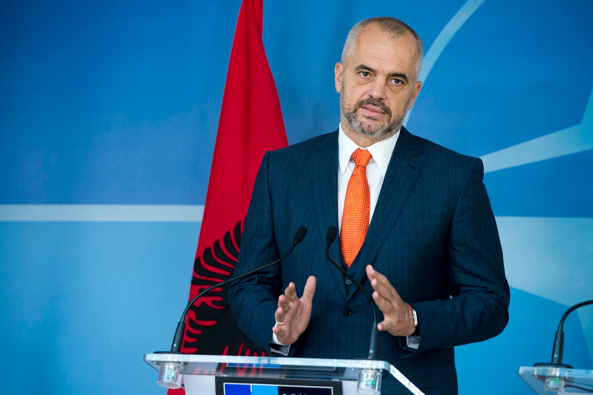 Albanian Prime Minister Edi Rama speaking at a podium