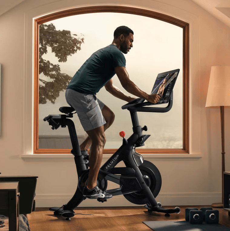 Peloton shares jump on amended guidance, and new CEO