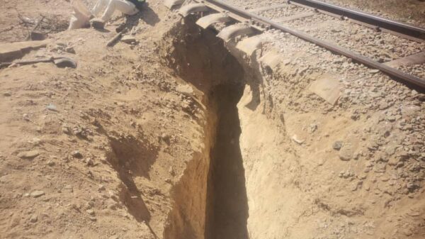 African miner faces up to 10 years in jail for digging under the railroad track