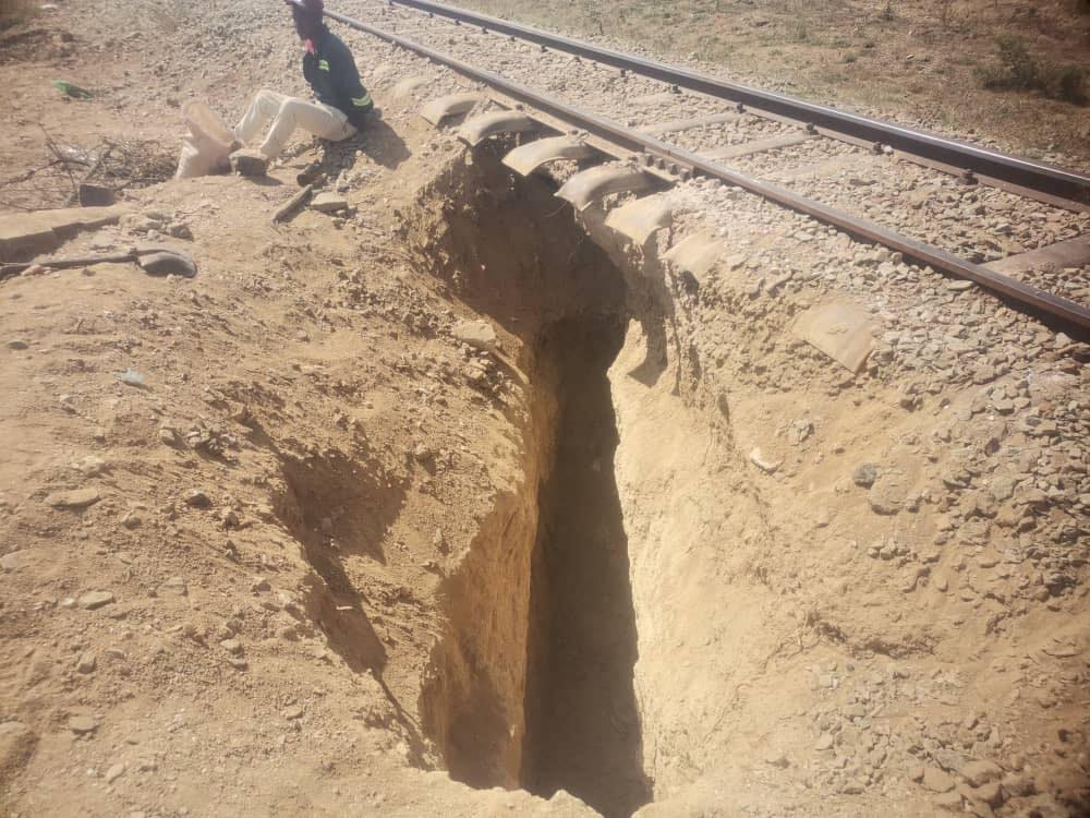 African miner faces up to 10 years in jail for digging under the railroad track