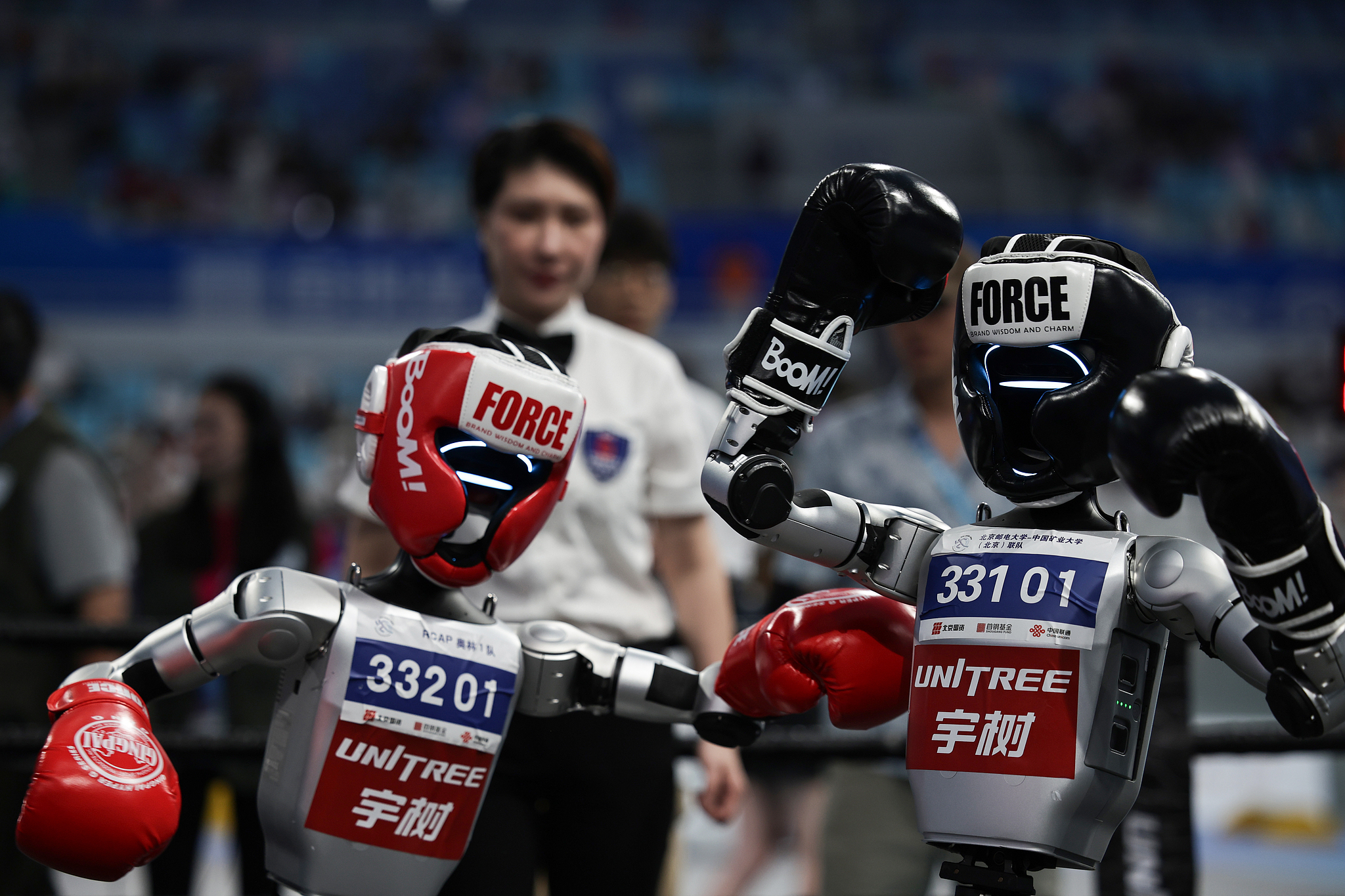 Humanoid robots smash each other's circuits at inaugural Beijing contest