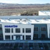 Komatsu celebrates erecting electric shovel monument at Nevada facility