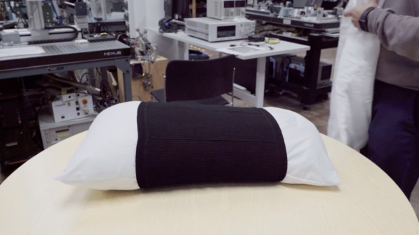 British school develops vibrating pillow sleeve to warn deaf people of night dangers